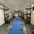 a custom blue gym astroturf track in a gym