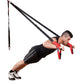 a man performing incline press ups on a gym suspension trainer