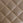 a custom orange stitching pattern on brown leather