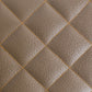 a custom orange stitching pattern on brown leather