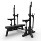 a black olympic weight bench with platform and safety spotters