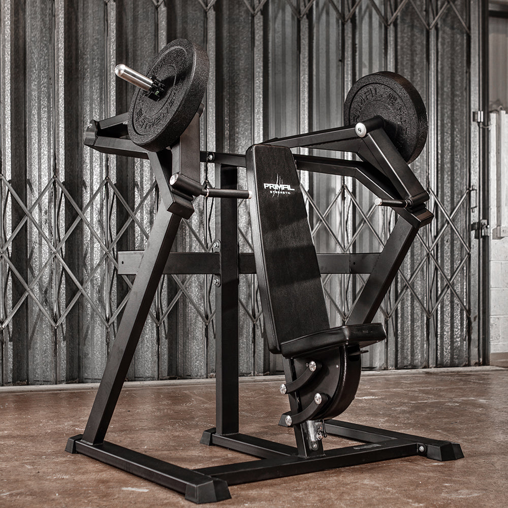 black plate loaded shoulder press machine loaded with a pair of weight plates