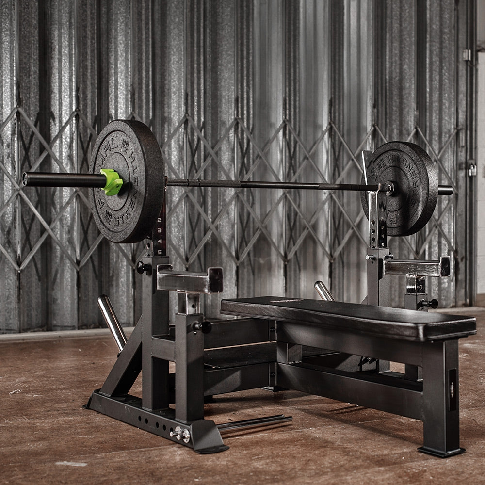adjustable olympic weight bench with olympic barbell loaded with a pair of weights